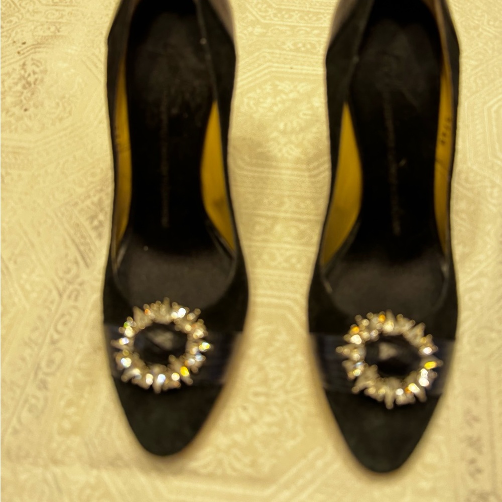 Giuseppe’s Zanetti Black Heels with Embellished silver buckle.